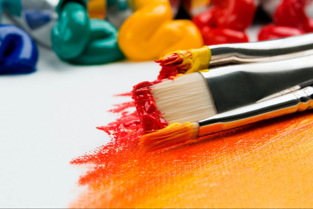 Paint brushes with paint on them