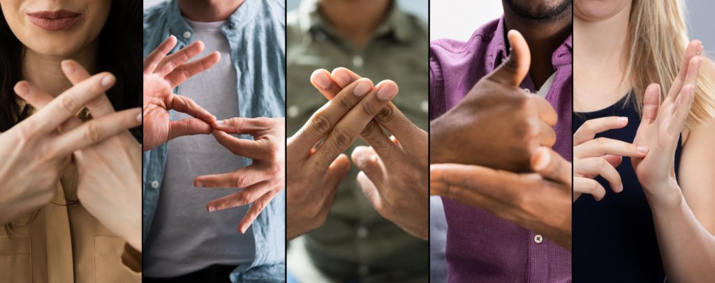 Adults Using Sign Language For Collage