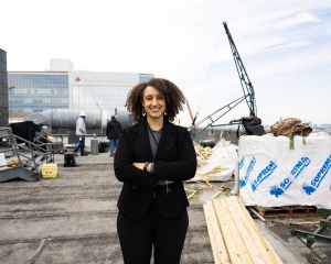 UTSA Online alum Shalita Myrick standing with arms folded